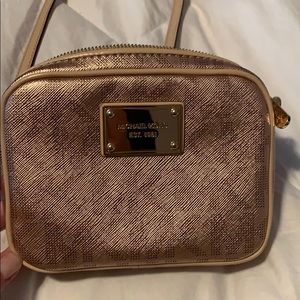 Metallic RoseGold Michael Kors crossbody 5”x6.5”